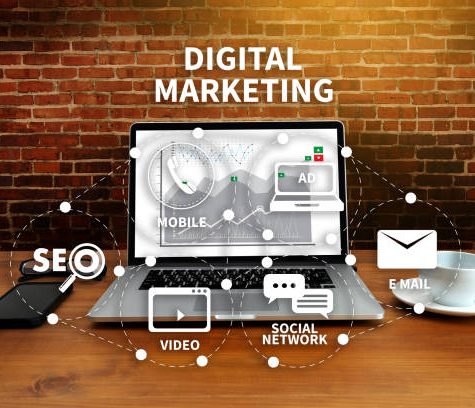 DIGITAL MARKETING new startup project MILLENNIALS Business team hands at work with financial reports and a laptop